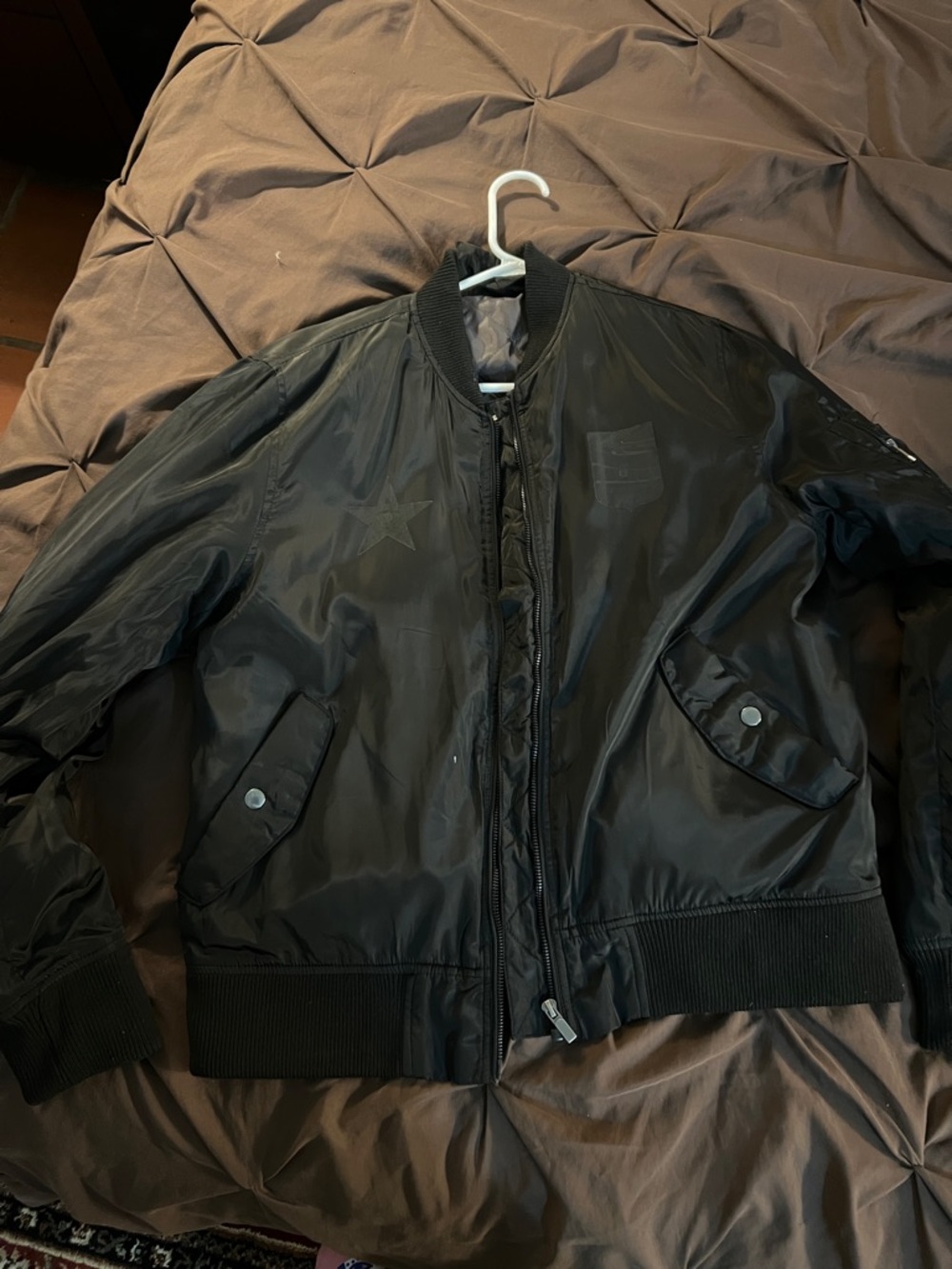 Classic Black Women's Bomber Jacket with Subtle Patch Detail